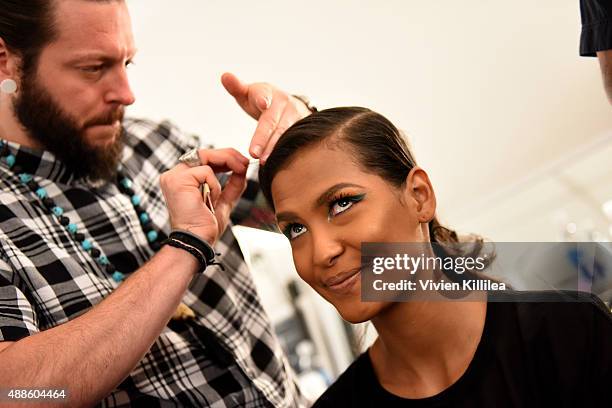 Model prepares backstage at Bibhu Mohapatra Spring 2016 during New York Fashion Week: The Shows at The Gallery, Skylight at Clarkson Sq on September...