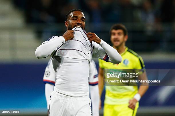 Alexandre Lacazette of Lyon reacts after missing a penalty in the final minutes during the UEFA Champions League Group H match between KAA Gent and...
