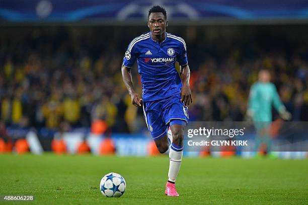 Chelsea's Ghanaian defender Baba Rahman runs with the ball during the UEFA Champions League, group G, football match between Chelsea and Maccabi Tel...