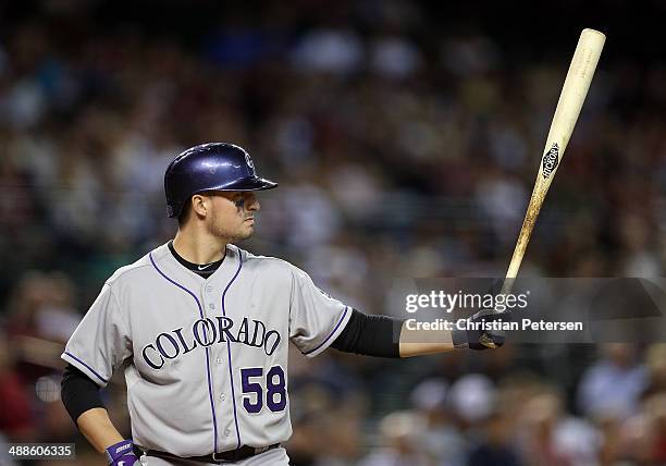 Jordan Pacheco of the Colorado Rockies bats against the Arizona Diamondbacks during the MLB game at Chase Field on April 29, 2014 in Phoenix,...