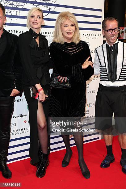 Nadja Auermann and Amanda Lear and Dr. Roger Diederen, Director Kunsthalle Muenchenduring the opening of the exhibition Jean Paul Gaultier 'From The...