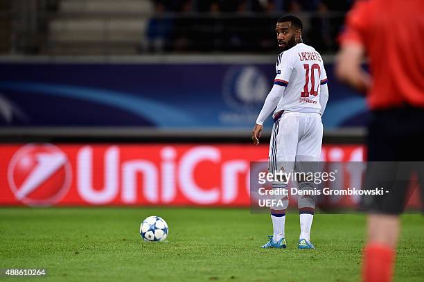 Alexandre Lacazette of Olympique Lyonnais looks on as he prepares for a penalty during the UEFA Champions League Group H match between KAA Gent and...