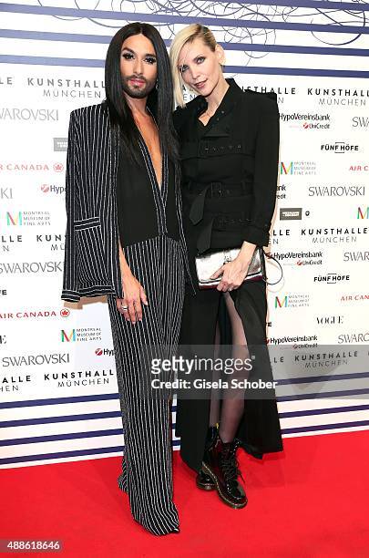 Singer Conchita Wurst and Nadja Auermann during the opening of the exhibition Jean Paul Gaultier 'From The Sidewalk To The Catwalk' at Kunsthalle on...