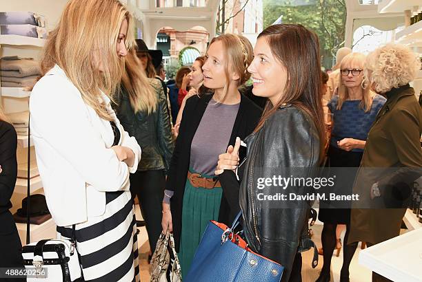 Ika Green, Martha Ward and Amanda Sheppard attend the launch of the Bamford South Audley store in Mayfair on September 16, 2015 in London, England.