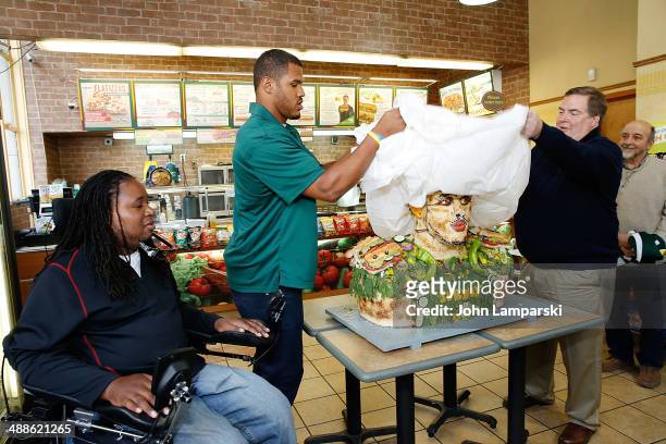 Former Football player, Eric LeGrand , Top 2014 Draft Prospect, Anthony Barr and Chief Marketing Officer for Subway Tony Pace attend Anthony Barr's...