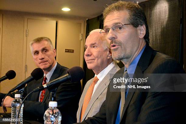 Paul Holmgren and team chairman Ed Snider listen in as Ron Hextall speaks during a press conference. The Philadelphia Flyers announced the promotion...