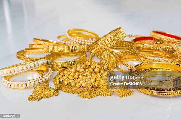 gold jewelry - gold jewellery india stock pictures, royalty-free photos & images