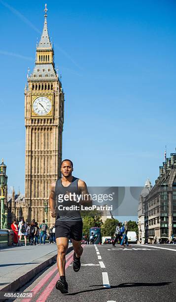 urban runner in central london - westminster bridge stock pictures, royalty-free photos & images