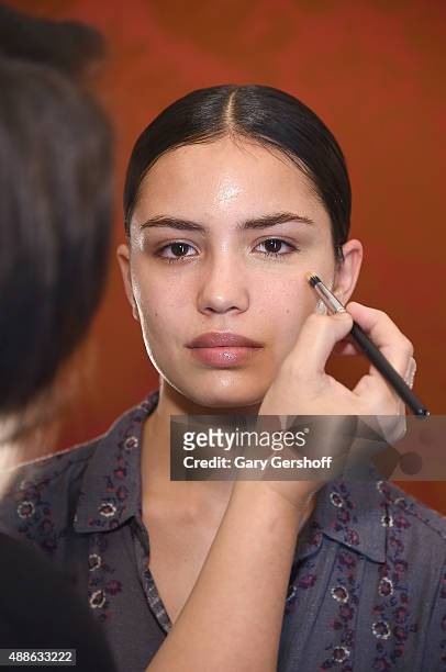 Model prepares backstage prior to the Marchesa fashion show during Spring 2016 New York Fashion Week at St. Regis Hotel on September 16, 2015 in New...