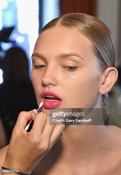 Model prepares backstage prior to the Marchesa fashion show during Spring 2016 New York Fashion Week at St. Regis Hotel on September 16, 2015 in New...