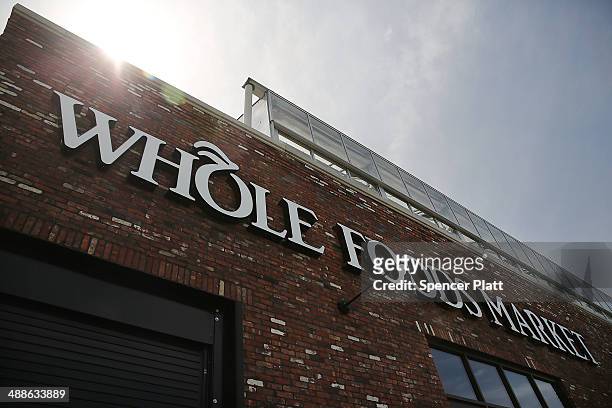 Sign for a Whole Foods Market is viewed in the Brooklyn borough on May 7, 2014 in New York City. Whole Foods Market, an upscale grocery store that...