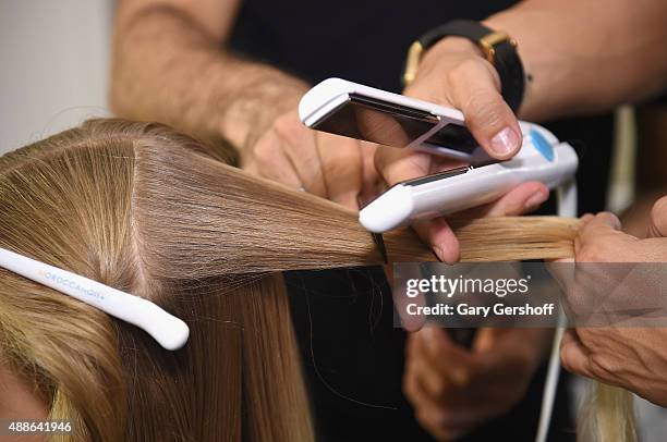 Model prepares backstage prior to the Marchesa fashion show during Spring 2016 New York Fashion Week at St. Regis Hotel on September 16, 2015 in New...