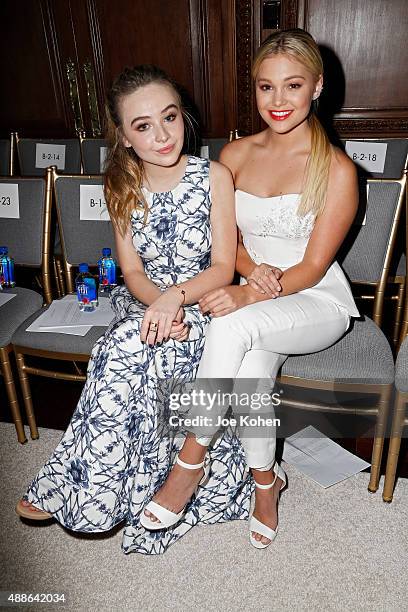 Sabrina Carpenter and Olivia Holt attend the Marchesa Spring 2016 fashion show during New York Fashion Week at St. Regis Hotel on September 16, 2015...