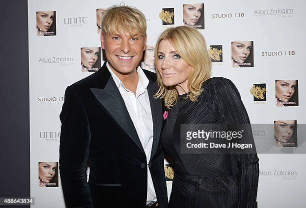 Michelle Collins and Gary Cockerill attend the book launch party for 'Simply Glamorous' By Gary Cockerill at Alon Zakaim on September 16, 2015 in...