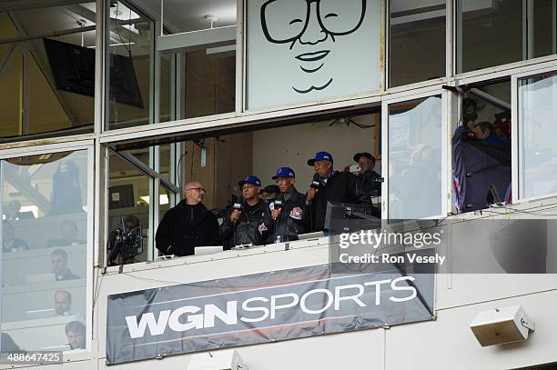 Cub greats Billy Williams, Ernie Banks and Fergie Jenkins sing Take Me Out to the Ballgame during the seventh inning stretch during the game between...