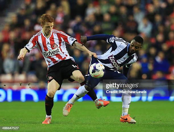 Stephane Sessegnon of West Bromwich Albion battles with Jack Colback of Sunderland during the Barclays Premier League match between Sunderland and...