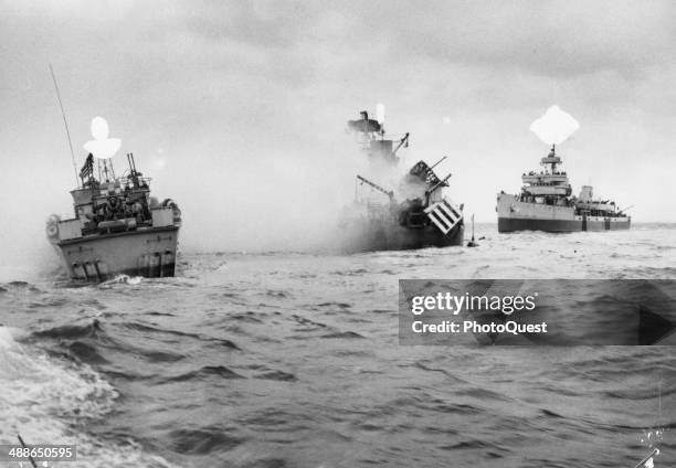 The USS Tide, a Navy minesweeper that preceded the invasion armada to the coast of Normandy, dies in the waters off France, June 6, 1944. This...