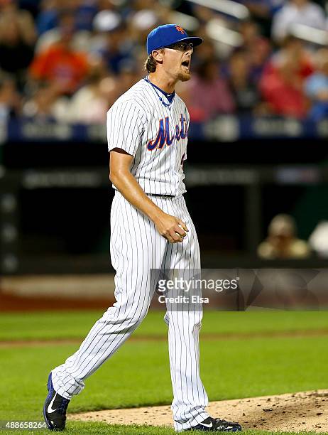 Tyler Clippard of the New York Mets reacts after he gave up a solo home run in the eighth inning against the Miami Marlins on September 16, 2015 at...