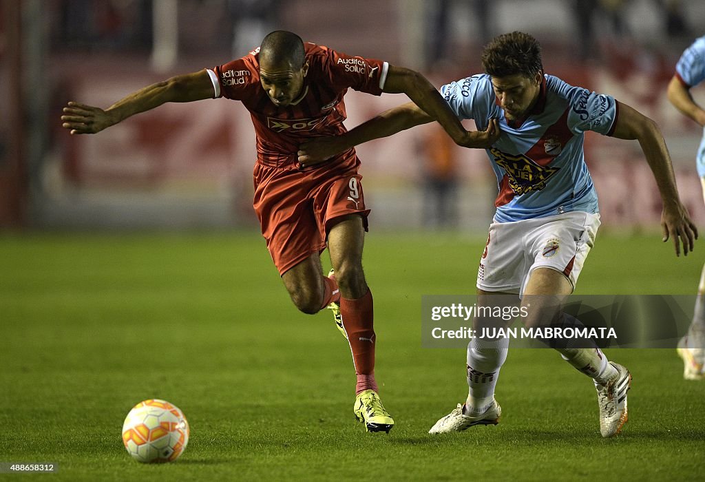 Argentina's Independiente forward Diego Vera vies for the ball with News  Photo - Getty Images