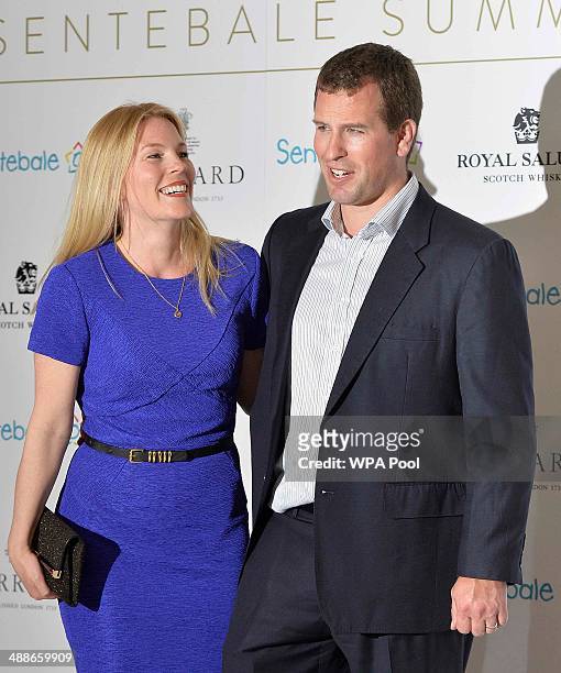 Peter Phillips and his wife Autumn arrive at the 'Sentebale Summer Party' at the Dorchester Hotel on May 7, 2014 in London, England.