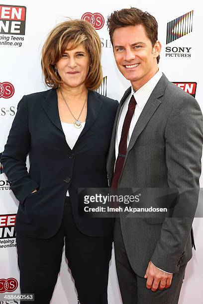 Co-Chairman of Sony Pictures Entertainment Amy Pascal and actor Brandon Johnson attend the TEEN LINE 2014 Food For Thought Luncheon at Beverly Hills...