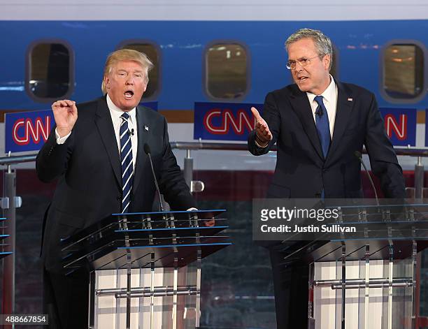 Republican presidential candidates Jeb Bush and Donald Trump take part in the presidential debates at the Reagan Library on September 16, 2015 in...