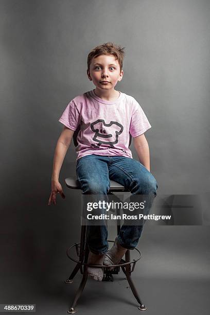 young boy wearing anti-bullying shirt - pink shirt stock pictures, royalty-free photos & images