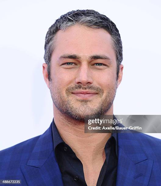 Actor Taylor Kinney arrives at the Los Angeles premiere of 'The Other Woman' at Regency Village Theatre on April 21, 2014 in Westwood, California.
