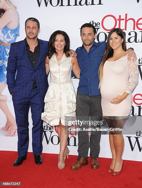 Actor Taylor Kinney and family arrive at the Los Angeles premiere of 'The Other Woman' at Regency Village Theatre on April 21, 2014 in Westwood,...