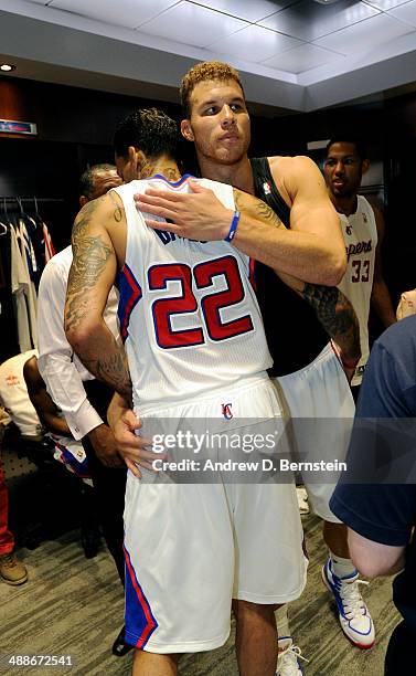 Matt Barnes and Blake Griffin of the Los Angeles Clippers celebrate in the locker room after winning a game against the Golden State Warriors in Game...