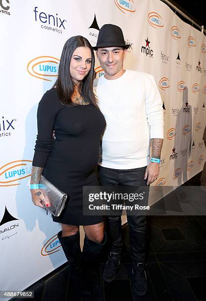 Musician Dennis DeSantis and guest attend the Get Lucky for Lupus LA celebrity poker tournament and party at Avalon on September 16, 2015 in...