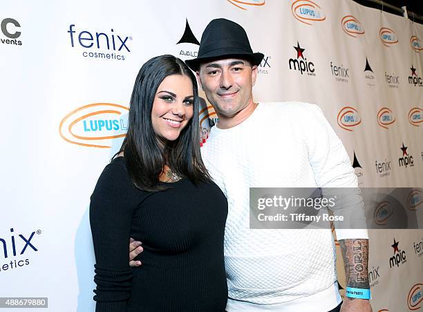 Musician Dennis DeSantis and guest attend the Get Lucky for Lupus LA celebrity poker tournament and party at Avalon on September 16, 2015 in...