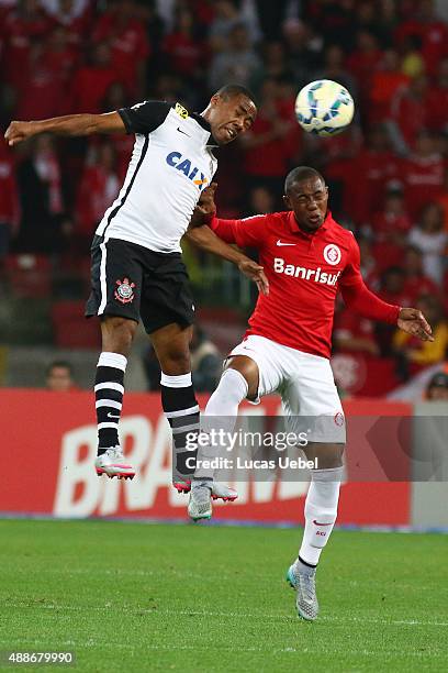 Wellington Martins of Internacional battles for the ball against Elias of Corinthians during the match between Internacional and Corinthians as part...