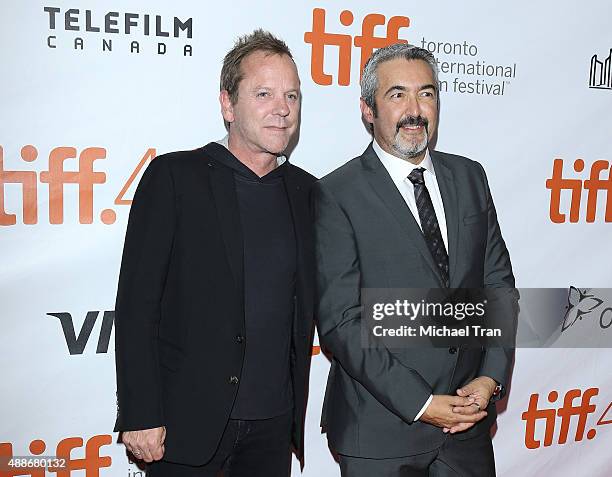 Kiefer Sutherland and Jon Cassar arrive at the "Forsaken" premiere during 2015 Toronto International Film Festival held at Roy Thomson Hall on...