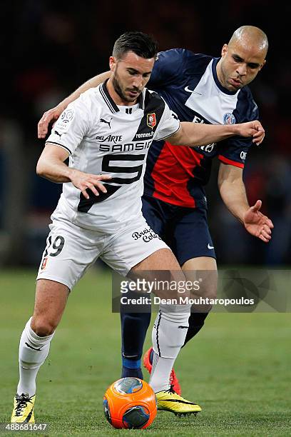 Alex of PSG and Romain Alessandrini of Rennes battle for the ball during the Ligue 1 match between Paris Saint-Germain FC and Stade Rennais FC at...