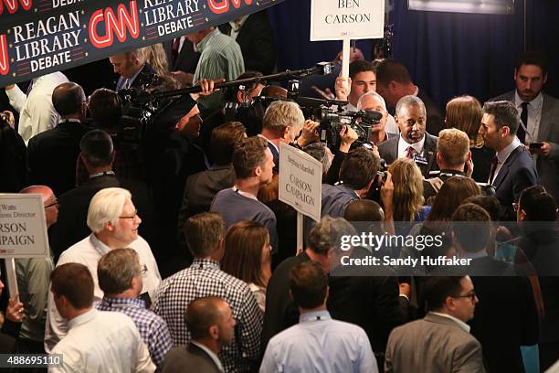 Republican presidential candidate Ben Carson speaks with reporters after the presidential debate at the Reagan Library on September 16, 2015 in Simi...