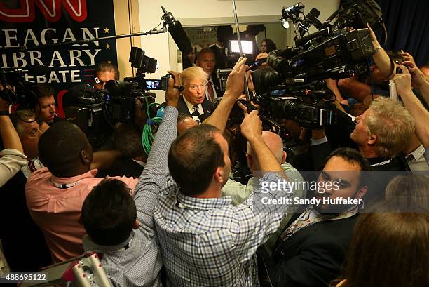 Republican presidential candidate Donald Trump speaks with reporters after the presidential debate at the Reagan Library on September 16, 2015 in...