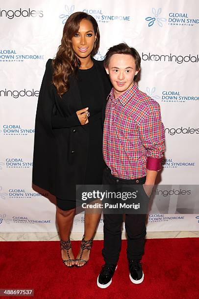 Singer/songwriter and philanthropist Leona Lewis poses for a photo with fashion show model Brandon Gruber at the 2014 Global Down Syndrome...