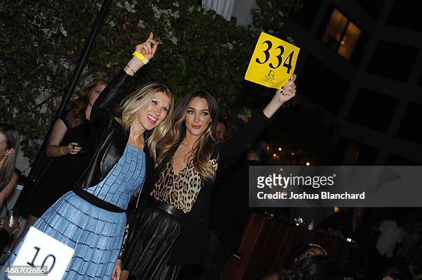 Guest and Courtney Sixx attend the Third Annual All Star Mixology Competition at SkyBar at the Mondrian Los Angeles on September 16, 2015 in West...