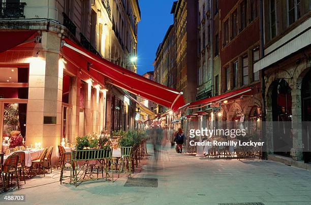 outdoor cafes at night in lyon, france - rhone stock-fotos und bilder