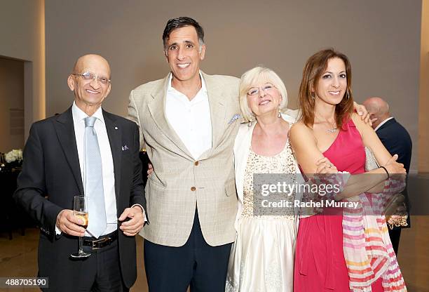 Franco Calarota, Adam Gross, Roberta Calarota, and Alessia Calarota attend a dinner reception for the Ryman/Morandi exhibition on September 16, 2015...