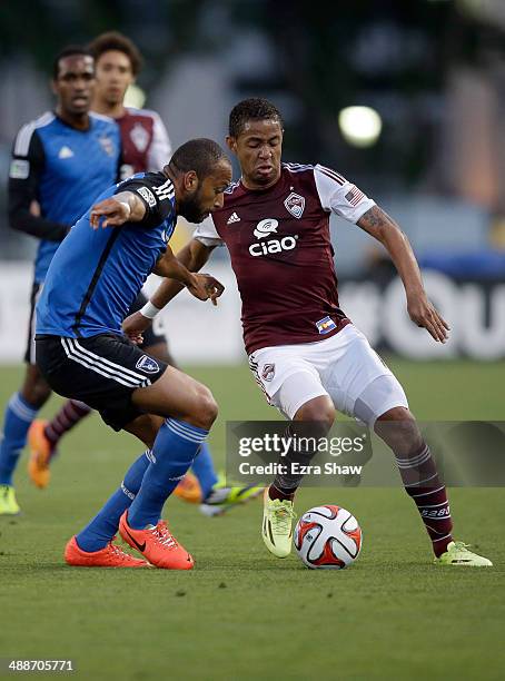 Gabriel Torres of Colorado Rapids tries to dribble around Victor Bernardez of San Jose Earthquakes at Buck Shaw Stadium on May 7, 2014 in Santa...