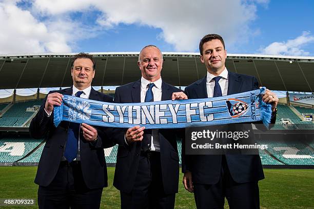 Sydney FC Chairman Scott Barlow, Head Coach Graham Arnold and CEO Tony Pignata pose for a photo during the Sydney FC A-League coach announcement at...