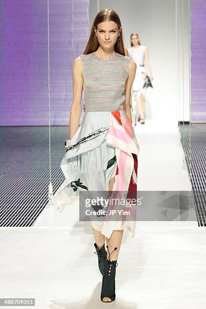 Model walks the runway during the Christian Dior Cruise 2015 show at Brooklyn Navy Yard on May 7, 2014 in the Brooklyn borough of Brooklyn, New York.