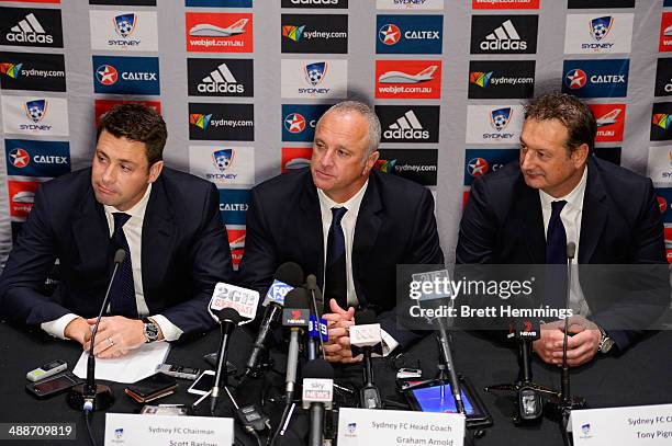 Sydney FC Chairman Scott Barlow, Head Coach Graham Arnold and CEO Tony Pignata pose for a photo during the Sydney FC A-League coach announcement at...