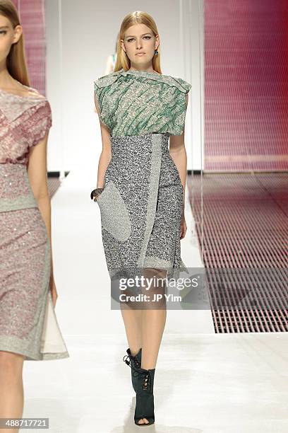 Model walks the runway during the Christian Dior Cruise 2015 show at Brooklyn Navy Yard on May 7, 2014 in the Brooklyn borough of Brooklyn, New York.