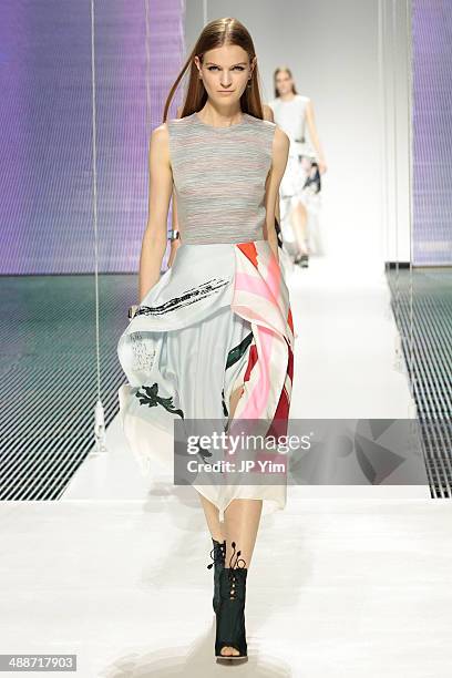 Model walks the runway during the Christian Dior Cruise 2015 show at Brooklyn Navy Yard on May 7, 2014 in the Brooklyn borough of Brooklyn, New York..