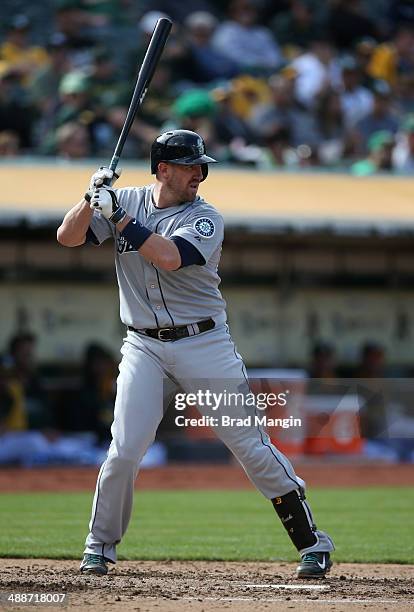 John Buck of the Seattle Mariners bats against the Oakland Athletics in game two of a doubleheader at O.co Coliseum on Wednesday, May 7, 2014 in...