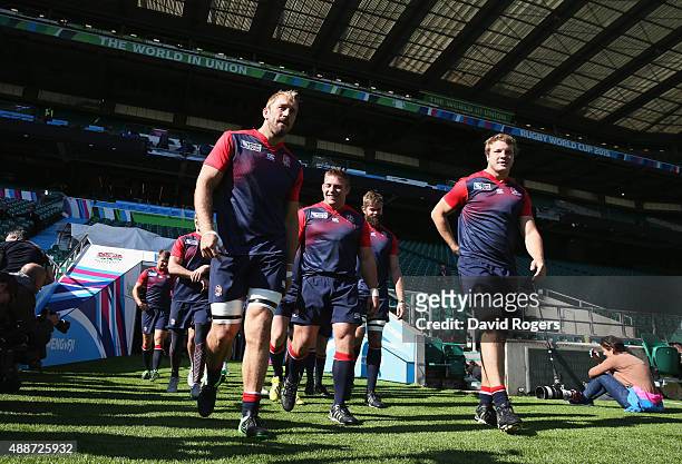 Captain Chris Robshaw walks out of the tunnel with team mates Tom Youngs , Geoff Parling and Joe Launchbury during the England Captain's Run on the...