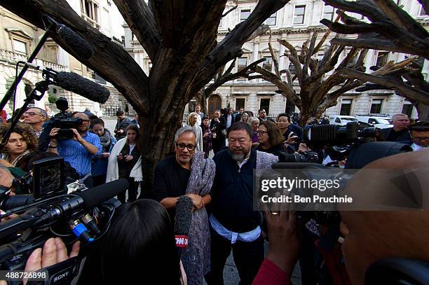 Ai Weiwei and Anish Kapoor are interviewed by journalists before beginning a walk through the city as part of a march in solidarity with migrants...